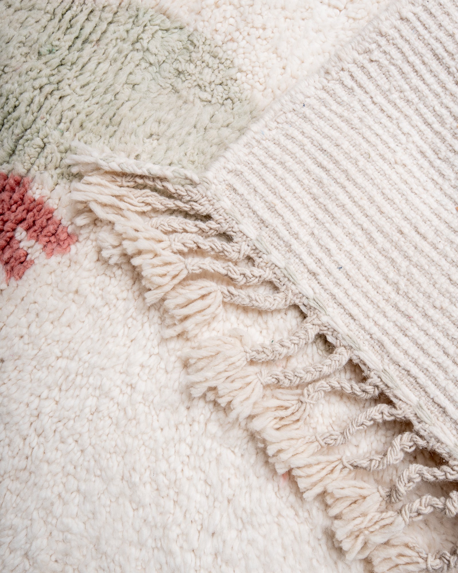 Modern, designer, handcrafted Berber rug from Morocco. Beniourain carpet with beautiful colours and patterns and fluffy wool texture.